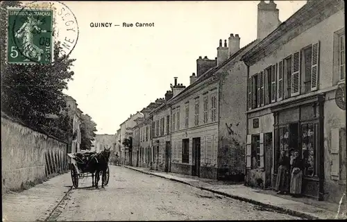 Ak Quincy Seine et Marne, Rue Carnot, Straßenpartie