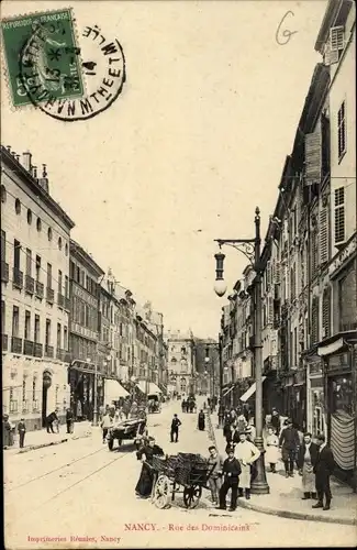 Ak Nancy Lothringen Meurthe et Moselle, Rue des Dominicains, Geschäfte, Passanten