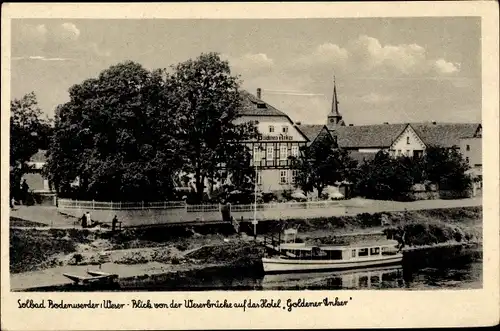 Ak Bodenwerder in Niedersachsen, Blick von der Weserbrücke auf das Hotel Goldener Anker, Dampfer