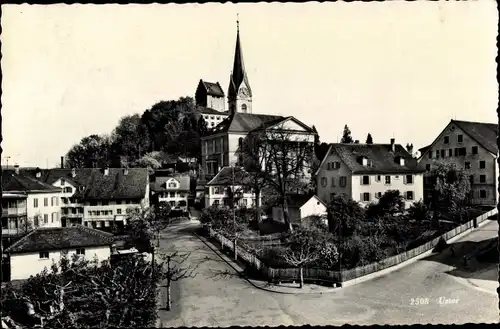 Ak Uster Kt. Zürich Schweiz, Straßenpartie, Kirche