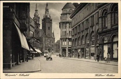 Ak Elberfeld Wuppertal, Wall mit Rathaus, Uhrenturm, Straßenbahn, Geschäfte