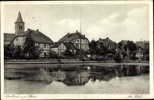 Ak Grohnde Emmerthal Weser, Am Teich, Uferpartie, Fachwerkhäuser, Kirche