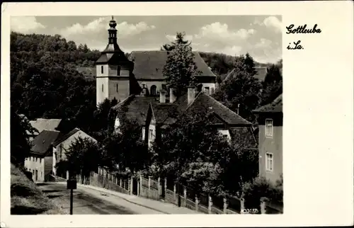 Ak Bad Gottleuba in Sachsen, Straßenpartie mit Petrikirche