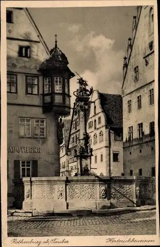 Ak Rothenburg ob der Tauber Mittelfranken, Herterichbrunnen, Apotheke