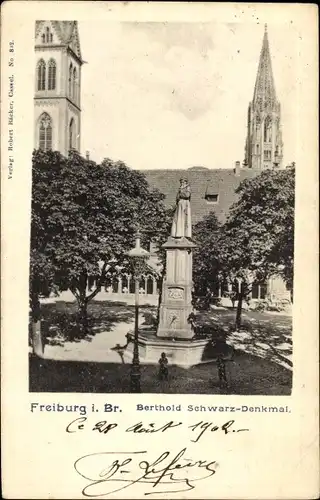 Ak Freiburg im Breisgau, Blick auf das Berthold Schwarz Denkmal, Turm vom Münster