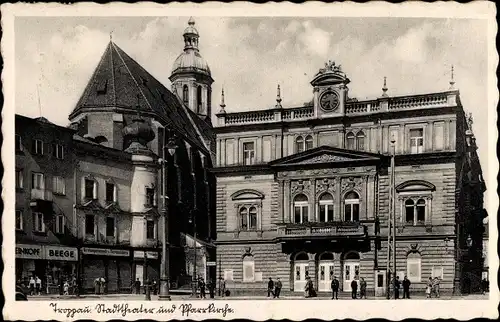 Ak Opava Troppau Reg. Mährisch Schlesien, Stadttheater mit Pfarrkirche