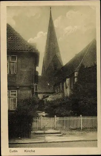 Ak Eutin in Ostholstein, Kirche, Außenansicht, Zaun, Haus