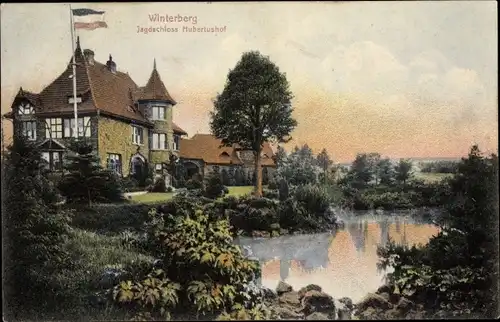 Ak Winterberg im Hochsauerlandkreis, Jagdschloss Hubertushof, Außenansicht, Teich, Garten, Bäume