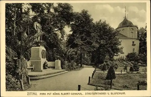 Ak Zittau in der Oberlausitz, Park mit König Albert Denkmal, Stadtgärtnerei und Blumenuhr