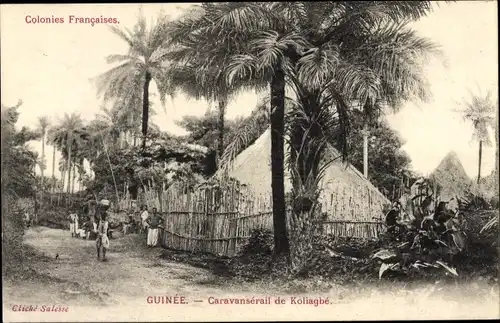 Ak Koliagbé Guinée Guinea, Caravansérail, cabanes, palmiers, rue