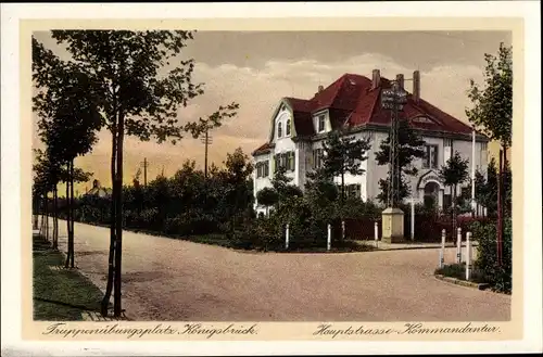 Ak Königsbrück in der Oberlausitz, Hauptstraße, Kommandantur, Truppenübungsplatz