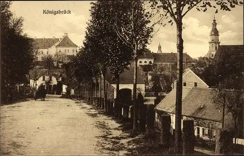 Ak Königsbrück in der Oberlausitz, Straßenpartie, Teilansicht vom Ort, Kirche, Pferdefuhrwerk