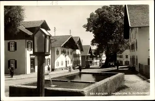 Ak Bad Kohlgrub Oberbayern, Hauptstraße m. Dorfbrunnen