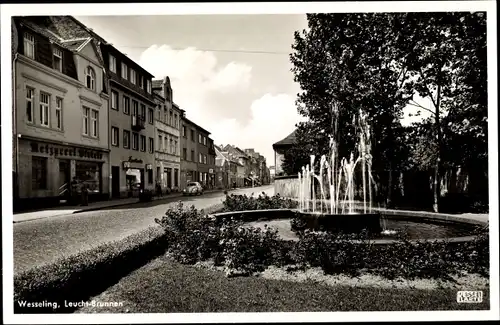 Ak Wesseling Nordrhein Westfalen, Leuchtbrunnen, Metzgerei