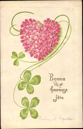 Präge Ak Bonne et heureuse fete, Herz aus Blumen, Kleeblätter