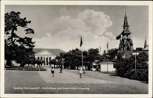 Ak Ostseebad Heringsdorf auf Usedom, Kulturhaus und Seebrückeneingang