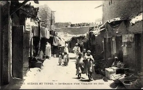 Ak Intérieur d'un village du Sud, Straßenpartie, Händler, Kinder