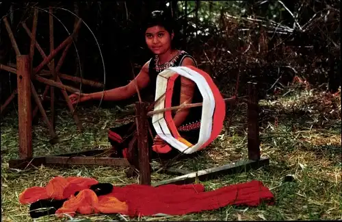 Ak Thailand, Young girl spinning cotton thread for weaving