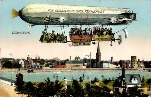 Ak Düsseldorf am Rhein, Rheinpartie mit Teilansicht von der Stadt, Zeppelin