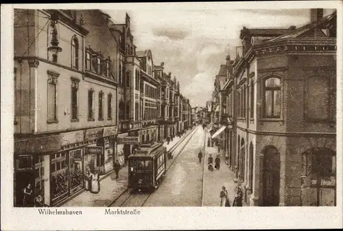 Ak Wilhelmshaven in Niedersachsen, Partie in der Marktstraße, Geschäfte, Straßenbahn