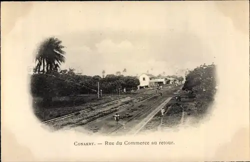 Ak Conakry Guinea, Rue du Commerce au retour