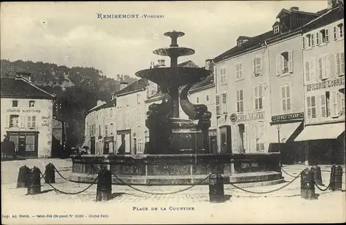 Ak Remiremont Vosges, Place de la Courtine, fontaine, magasin Heitzmann