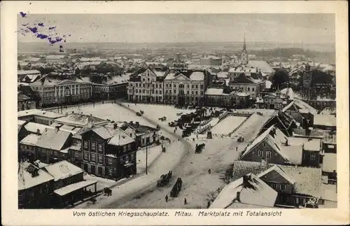 Ak Jelgava Mitau Lettland, Marktplatz im Winter, Blick über die Dächer der Stadt