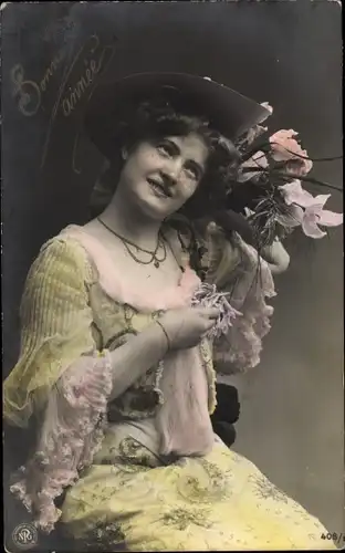 Ak junge sitzende Frau mit Hut, Rüschenkleid, Blumen, Portrait