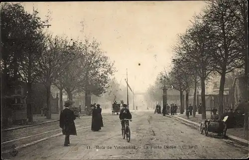 Ak Paris Reuilly, La Porte Dorée, Passanten, Radfahrer
