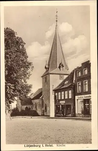 Ak Lütjenburg in Schleswig Holstein, Blick auf die Kirche, Straßenpartie im Ort