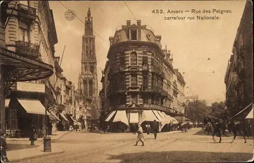 Ak Antwerpen Anvers Flandern, Rue des Peignes, carrefour rue Nationale, Geschäfte, Passanten