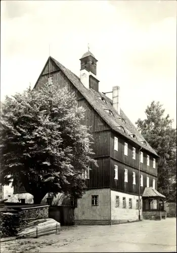 Ak Cunnersdorf Gohrisch in Sachsen, Forsthaus, Holzlager