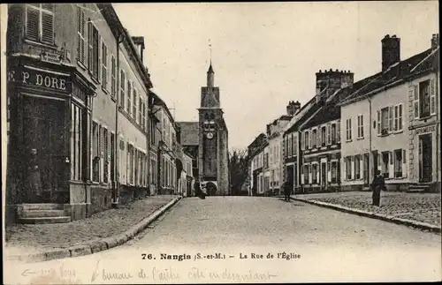 Ak Nangis Seine et Marne, La Rue de l'Eglise, Geschäft P. Dore