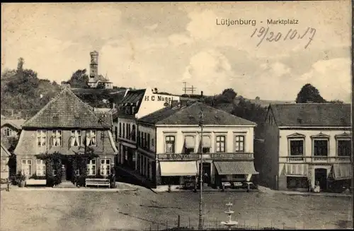 Ak Lütjenburg in Holstein, Marktplatz, Geschäft H. C. Nagel