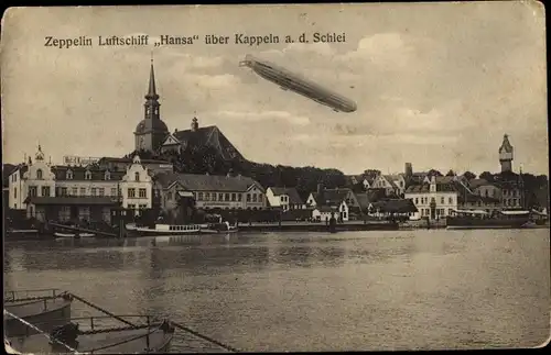 Ak Kappeln an der Schlei, Zeppelin Luftschiff Hansa über der Stadt, Wasserturm