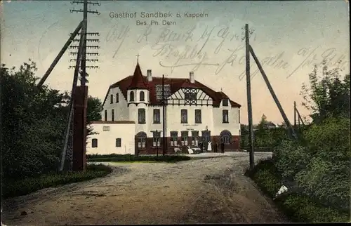 Ak Sandbek Kappeln an der Schlei, Straßenpartie mit Blick auf Gasthof Sandbek, Ph. Dern