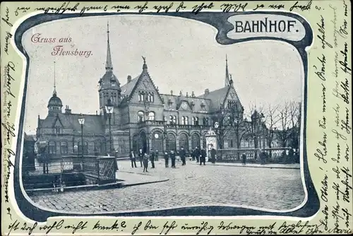 Passepartout Ak Flensburg in Schleswig Holstein, Blick auf den Bahnhof, Straßenseite