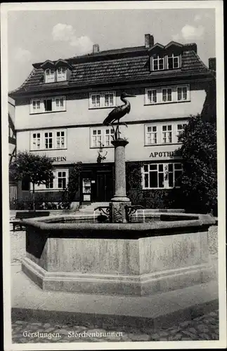 Ak Gerstungen in Thüringen, Storchenbrunnen, Apotheke