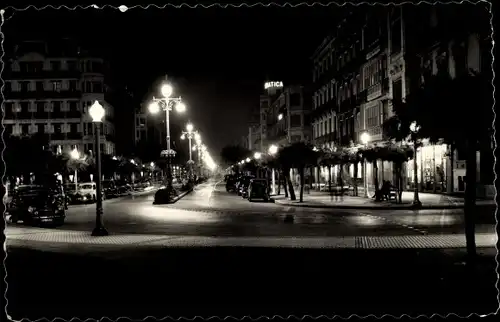 Ak San Sebastian Baskenland, Spanische Straße bei Nacht