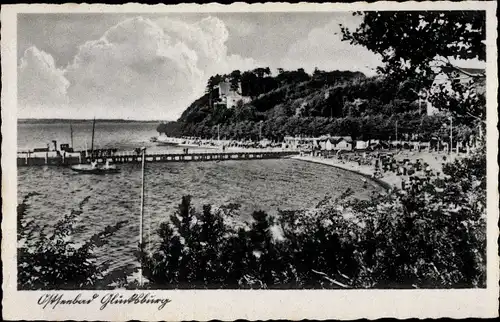 Ak Glücksburg an der Ostsee, Durchblick zum Strand