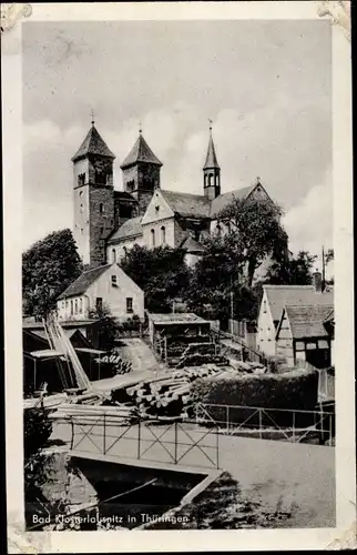 Ak Bad Klosterlausnitz in Thüringen, Teilansicht vom Ort, Brücke, Kirche, Holzstämme