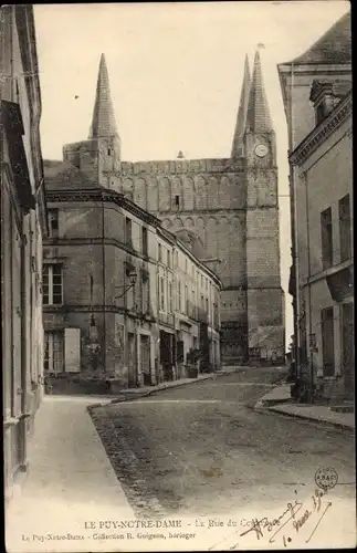 Ak Le Puy Notre Dame Maine et Loire, La Rue du Commerce