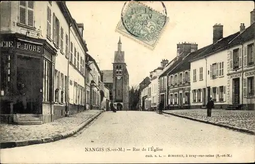 Ak Nangis Seine et Marne, Rue de l'Église, Pharmacie P Dore, clocher, Imprimerie