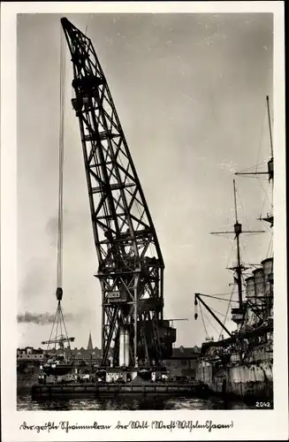 Ak Wilhelmshaven in Niedersachsen, Schwimmkran, Werft, Deutsches Kriegsschiff