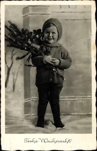 Ak Glückwunsch Weihnachten, Kind mit Tannenzweigen