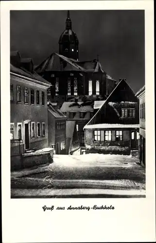 Ak Annaberg Buchholz im Erzgebirge, Straßenpartie mit Kirche bei Nacht