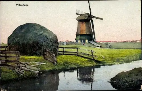 Ak Volendam Nordholland Niederlande, Windmühle, Partie am Wasser