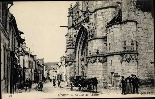 Ak Moret-sur-Loing Seine et Marne, La Rue de l'Église, Kutsche