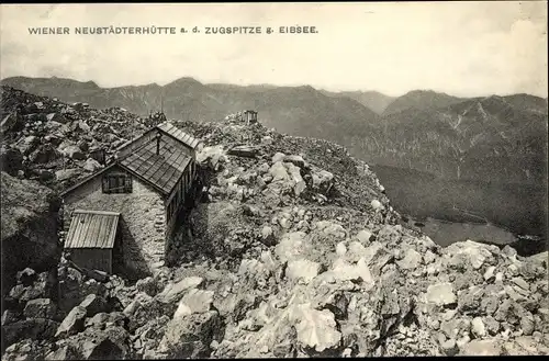 Ak Wettersteingebirge, Wiener Neustädter Hütte, auf der Zugspitze gegen Eibsee