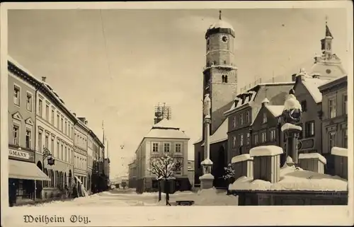 Ak Weilheim Oberbayern, Kirche im Schnee, Dorfpartie